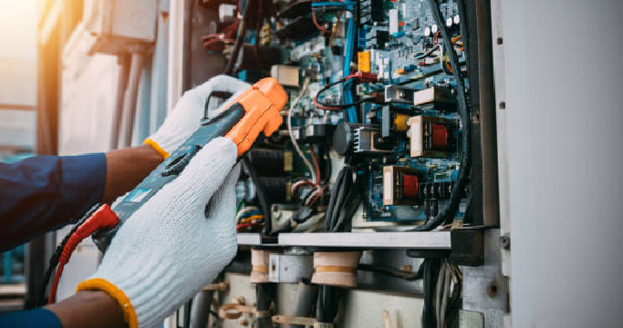 Industrial PLC control panel with HMI touch screen and VFD motor drive system