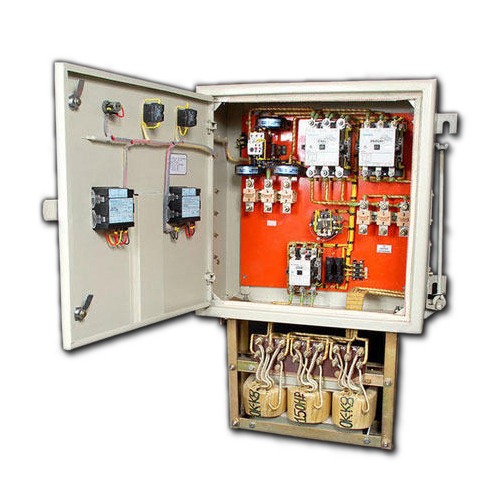 Industrial star-delta motor starter panel with contactors and transformer coils for three-phase power control by Three Phase Electric Company.